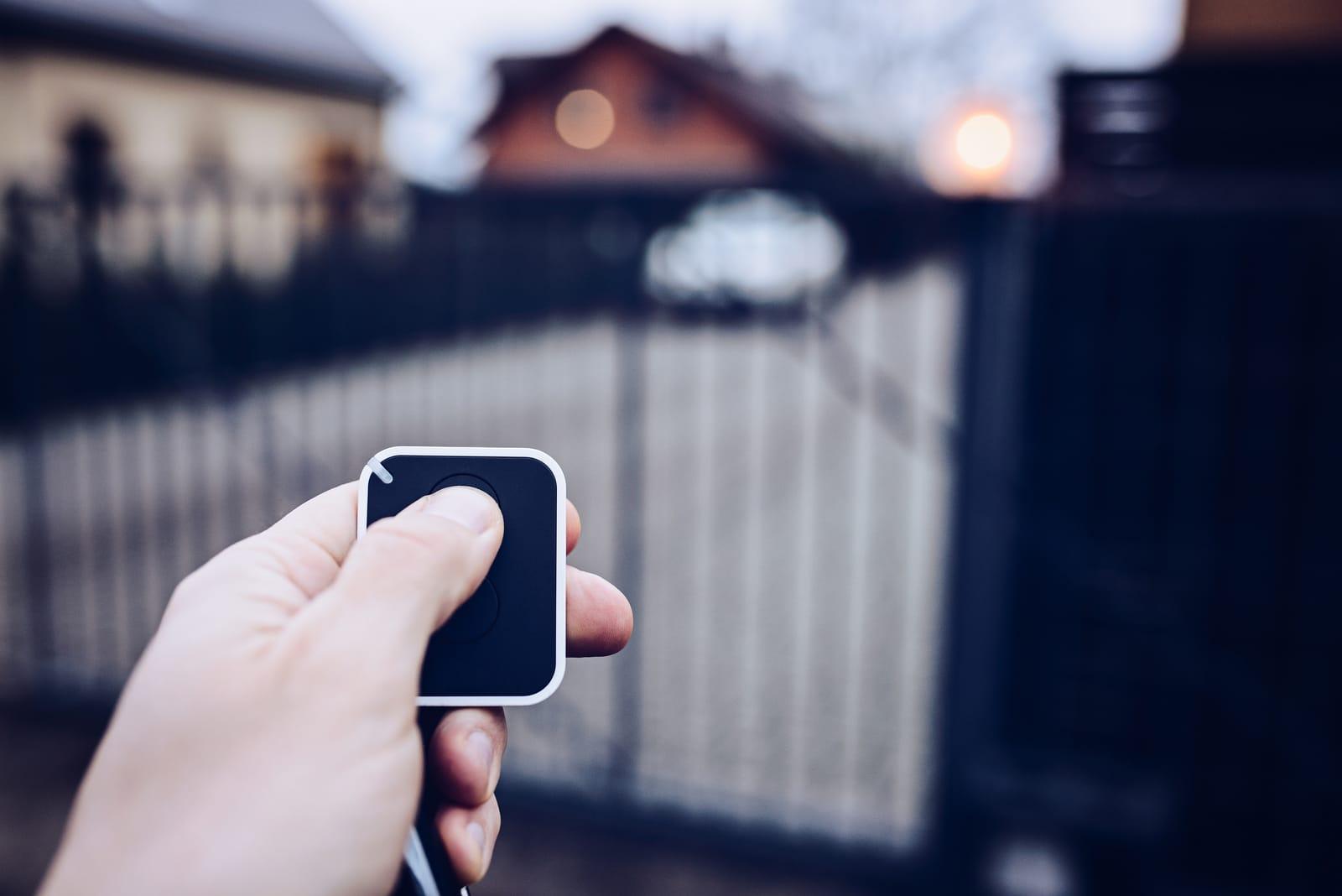 Remote control opening an automatic driveway gate